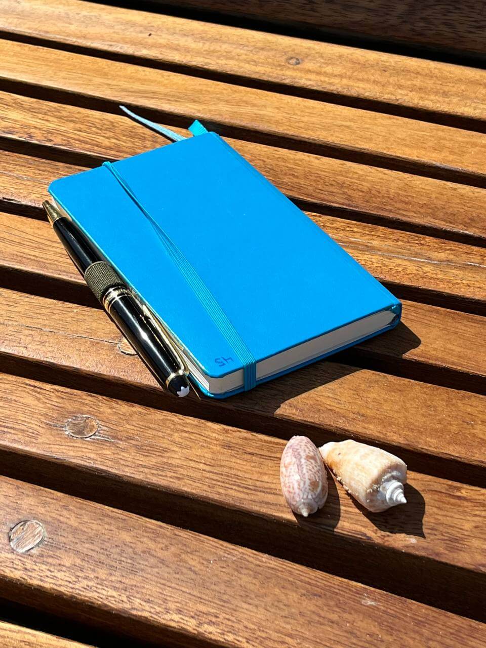 One of Mike's traditional blue notebooks he carries around as if the digital age were something that happened to other people.